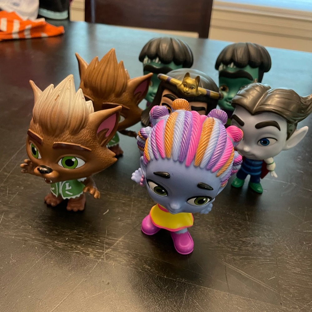 Super Monsters musical van and characters